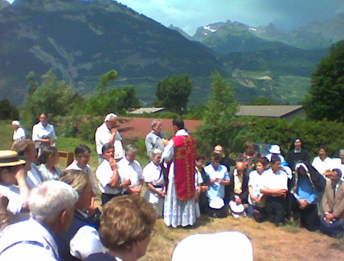 A priest giving blessings after ordination at the International Seminary of Saint Pius X, in Écône, Switzerland.