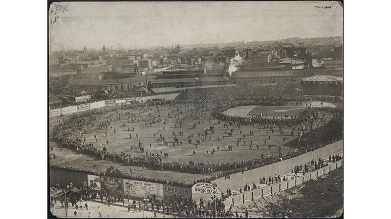 Fans gather on the field at the Huntington Avenue Grounds during the 1903 World Series. (Boston Globe / Boston Public Library)