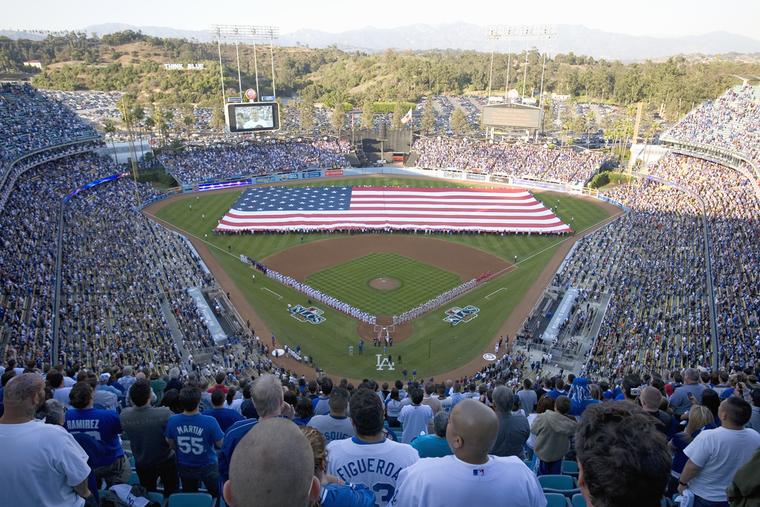 Large American flag on display during the opening ceremony of the National League Championship Series at Dodger Stadium in Los Angeles, Calif. 