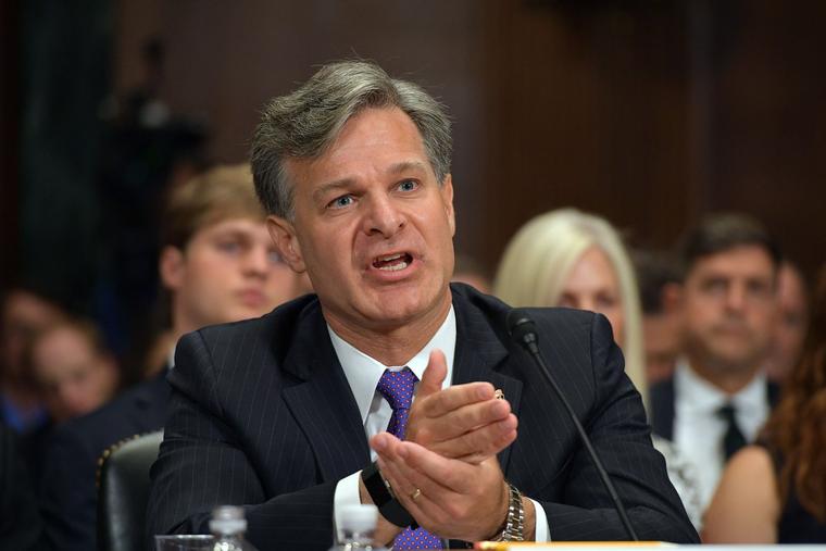 FBI Director Christopher Wray is shown in 2017 during his Senate confirmation hearing. Last month, Wray reiterated his contention that an internal FBI memo that targeted ‘radical-traditionalist Catholics’ as potential domestic terrorists was merely a regrettable blunder by an agent.