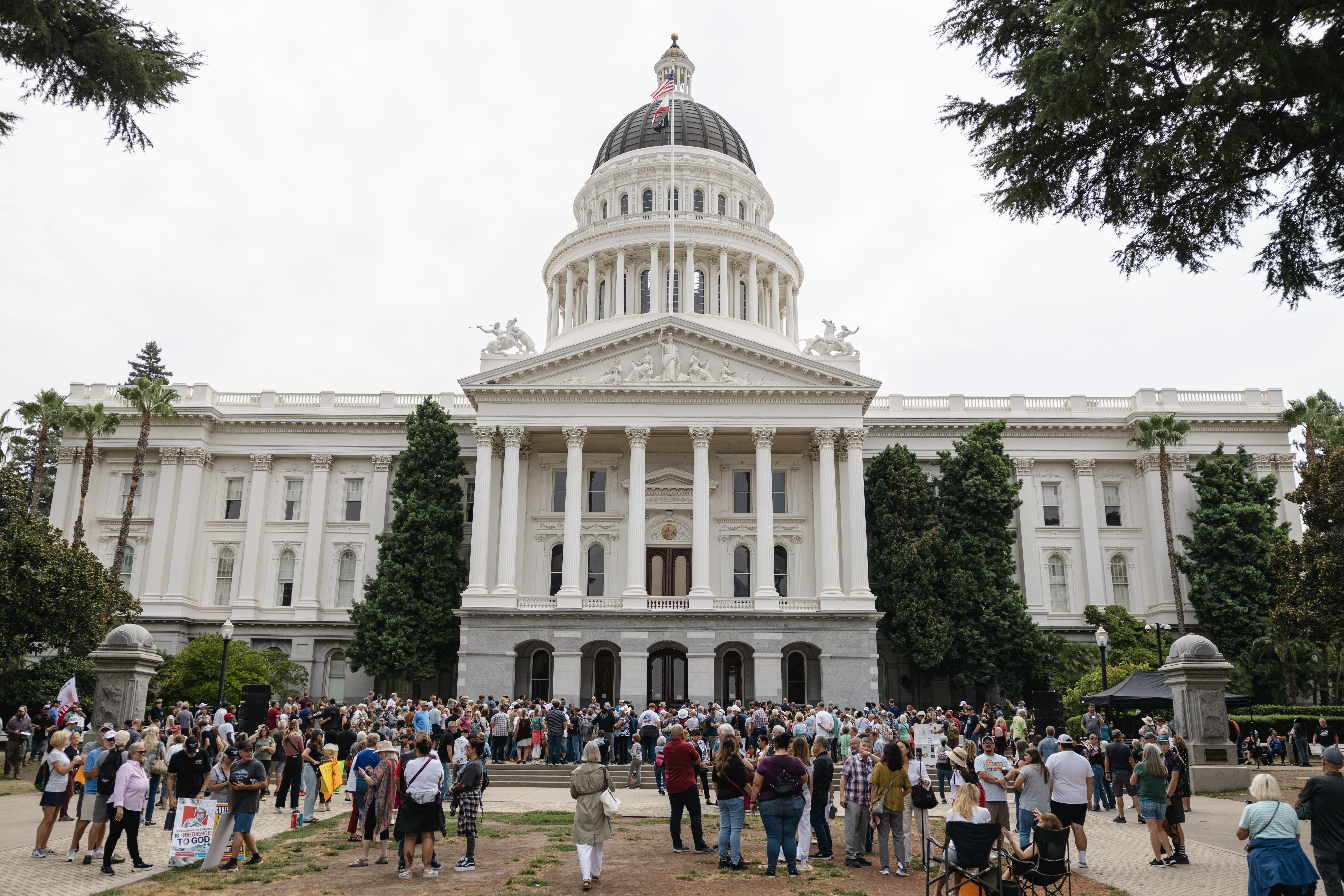 About 1,000 Californians rallied in front of the state capitol steps in Sacramento on Aug. 21, 2023, to protest a series of bills they say would take away their rights as parents. | Credit: Snejanna Yalanji