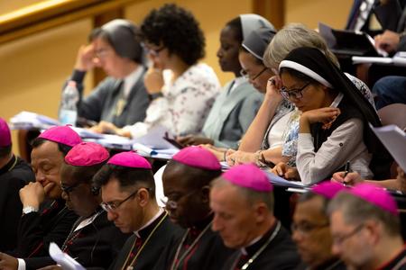 Participants and observers gather Oct. 3, 2018, for a general assembly of the Synod of Bishops at the Vatican.