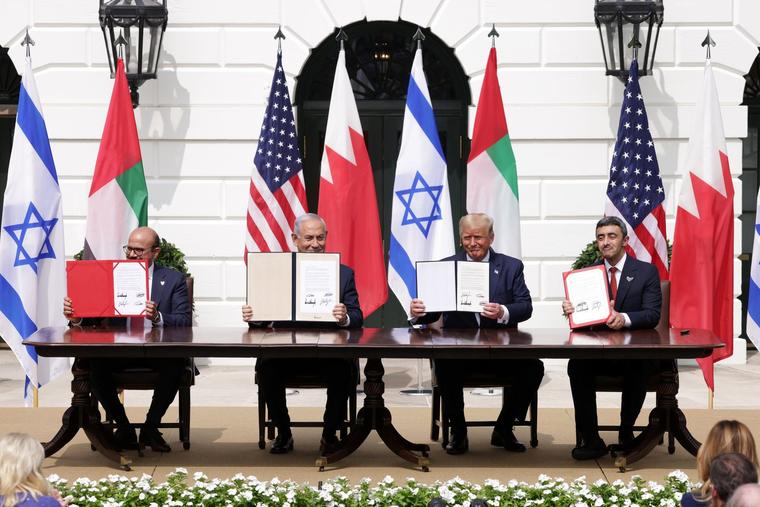 From left, Foreign Affairs Minister of Bahrain Abdullatif bin Rashid Al Zayani, Prime Minister of Israel Benjamin Netanyahu, U.S. President Donald Trump, and Foreign Affairs Minister of the United Arab Emirates Abdullah bin Zayed bin Sultan Al Nahyan participate in the signing ceremony of the Abraham Accords on the South Lawn of the White House on Sept. 15, 2020 in Washington.