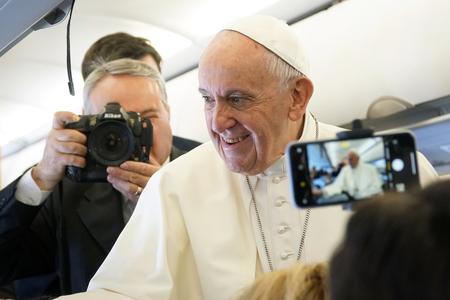 Pope Francis speaks to journalists during his flight from Rome to Rabat, Morocco, on March 30, 2019.