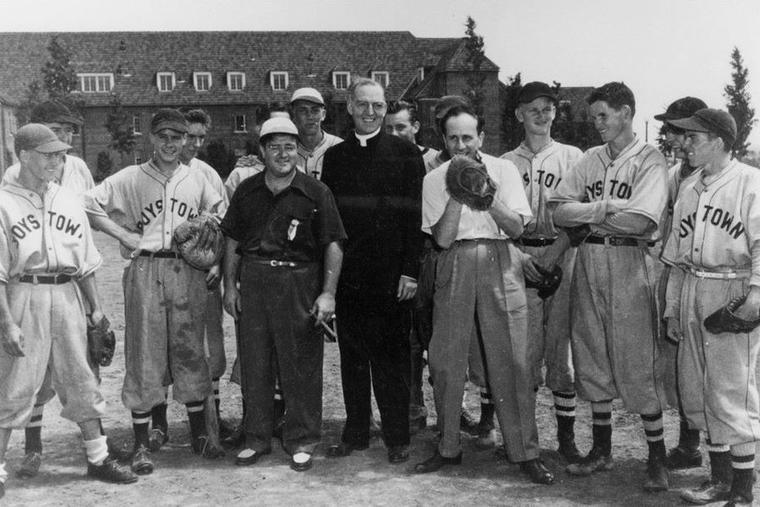 Father Edward Flanagan with baseball players at Boys Town