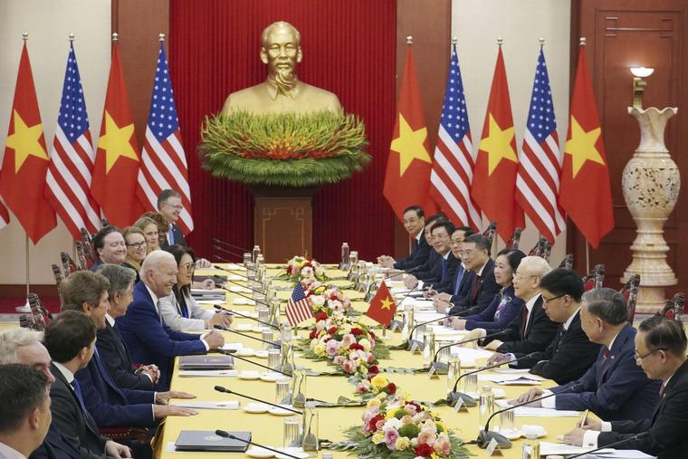President Joe Biden (6th from L) and Vietnam's Communist Party General Secretary Nguyen Phu Trong (4th from R) hold talks in Hanoi, Vietnam, on Sept. 10, 2023. 
